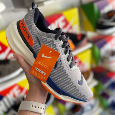 Nike zoomx cinza laranja branco