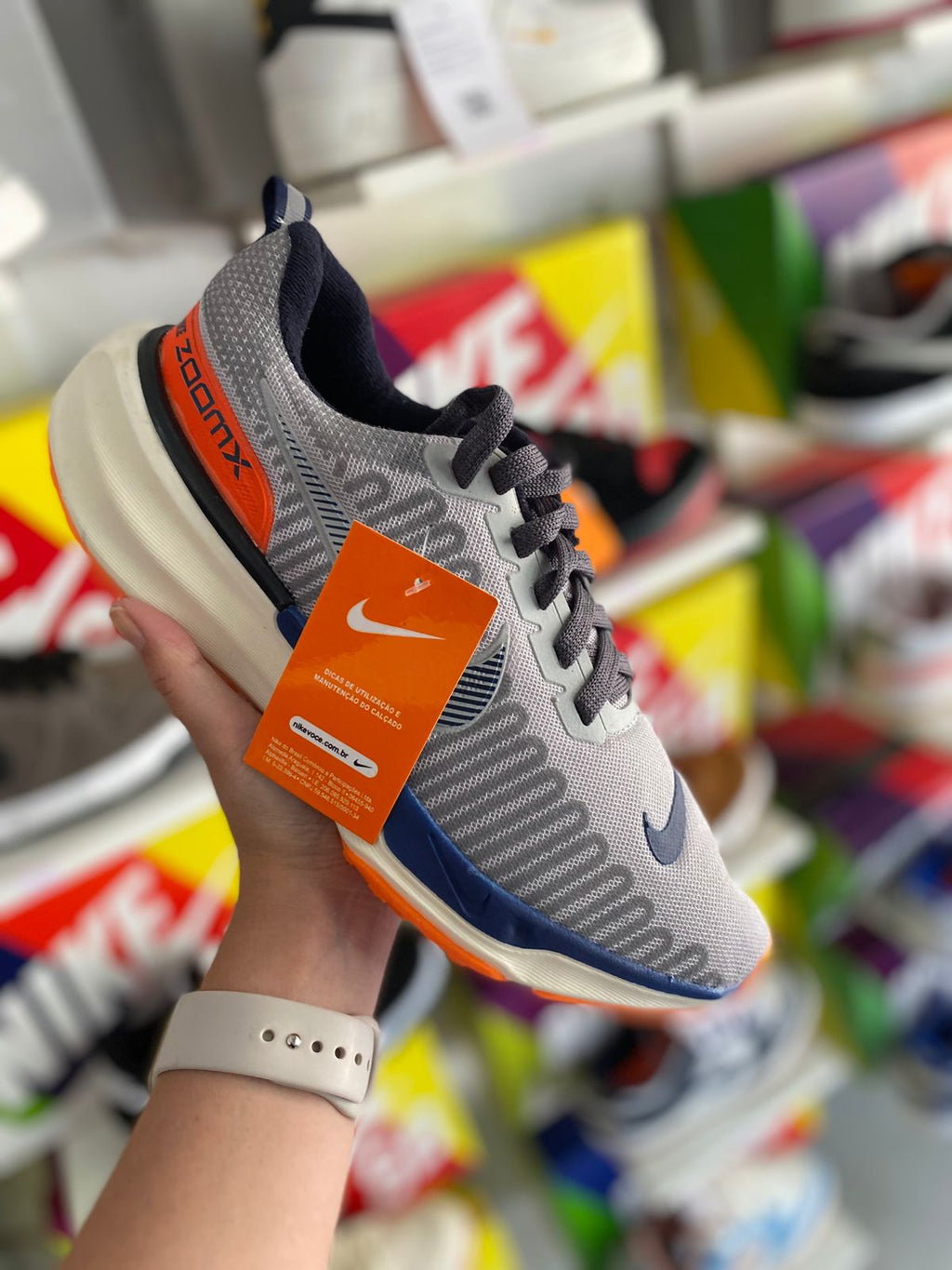 Nike zoomx cinza laranja branco
